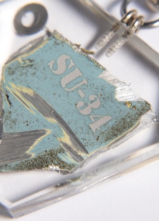 Keyring with a piece of taken down russian su-34 aircraft1 photo