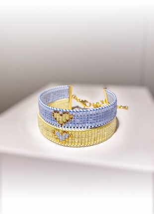 Double yellow-blue bracelet with a heart.