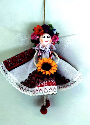 Doll in an embroidered dress