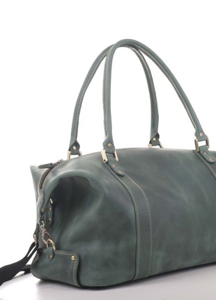 A beautiful and high-quality weekender bag of rich green color2 photo