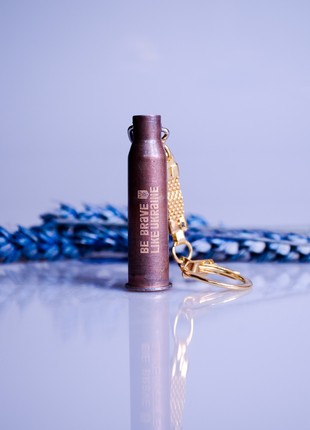 The keychain is made from a spent combat cartridge case "Be brave like Ukraine"