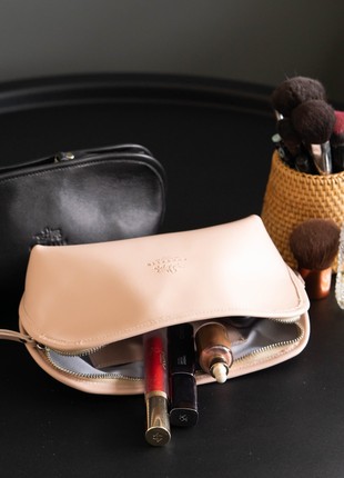 Leather cosmetic bag in powder color.3 photo