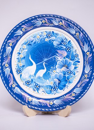 Petrykivka decorative blue plate with birds at dawn, hand-painted