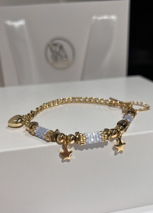 Bracelet with tubes of beads on a chain