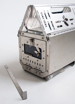 Stove in a tent on wood! The stove is a tourist stove! Camping stove! Mini-stove!