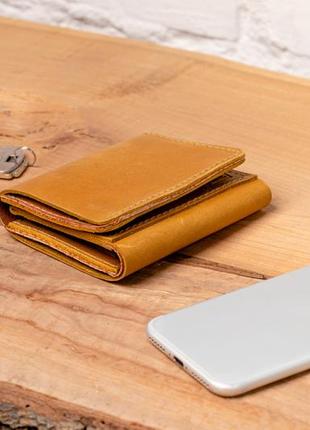 Coin button smooth leather wallet with zipped pocket