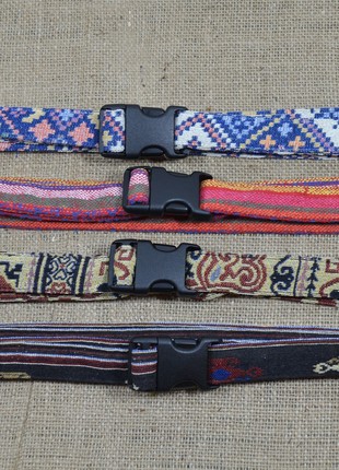 Textile belt with fastex in ethnic style.