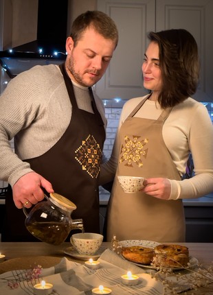 A set of aprons for a couple