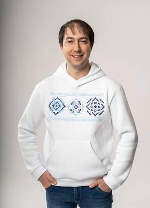 White pair of fleece hoodies with coded ornaments "I love you"