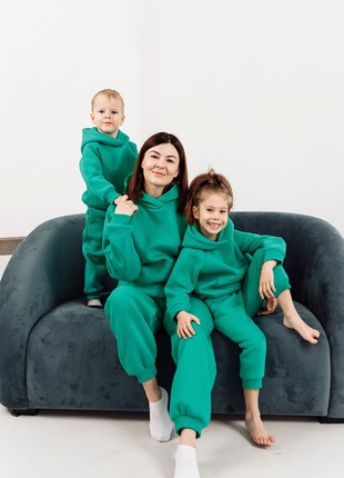 Children's insulated suit for girls of green color