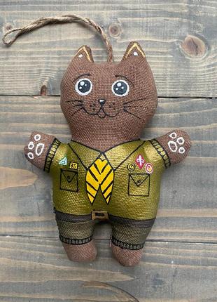 Cat in a scout uniform1 photo