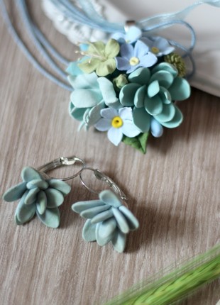 Mint jewelry set with flowers. Earrings and pendant