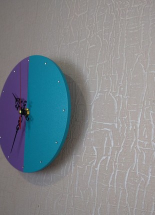 Wall clock delicate two-tone with rhinestones instead of a dial4 photo