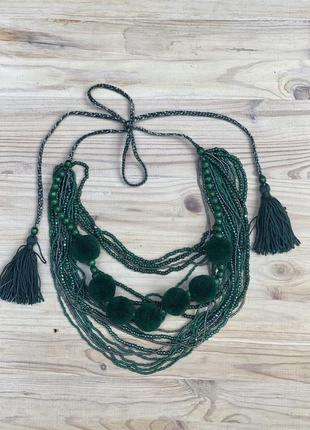 Green beaded necklace with tassels