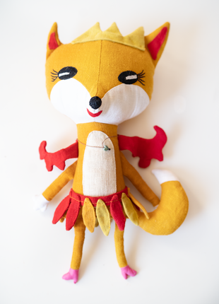 Soft stuffed toy "Sister Foxy" based on children drawing.
