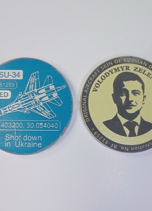 Souvenir coin from the skin of the SU-34 aircraft.5 photo