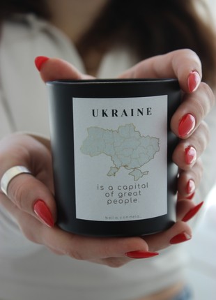 Scented Ukrainian candle "Ukraine is a capital of great people" with a wooden wick in a black glass.2 photo