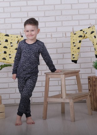 Pajamas for boys and girls of dark blue color with Dinosaurs