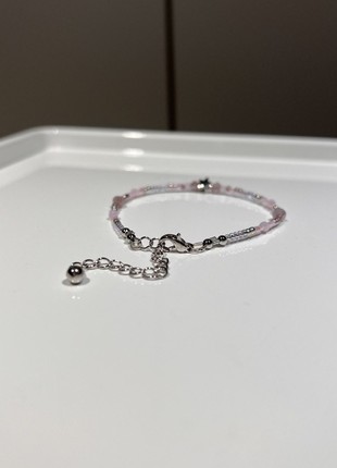 Minimalist bracelet made of beads and beads with a star in pink with silver hardware3 photo
