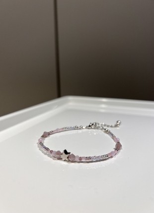 Minimalist bracelet made of beads and beads with a star in pink with silver hardware2 photo