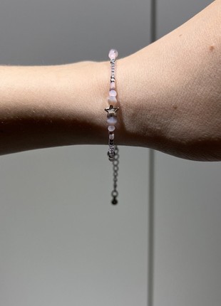 Minimalist bracelet made of beads and beads with a star in pink with silver hardware4 photo