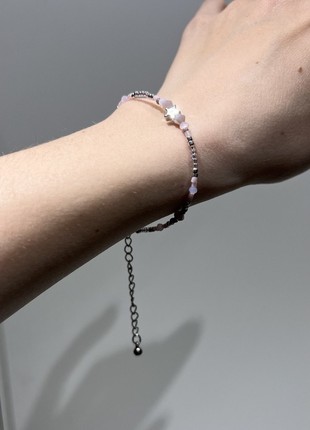 Minimalist bracelet made of beads and beads with a star in pink with silver hardware5 photo
