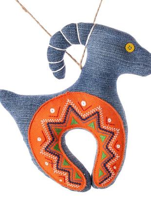 Denim goat with an orange embroidered horseshoe2 photo
