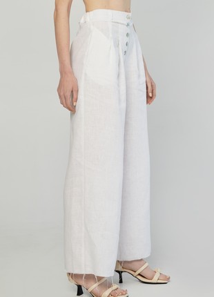 Linen high-waisted palazzo pants with raw hems and belt. Kvit Collection