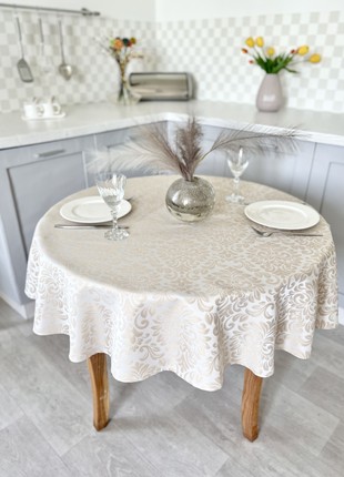 Teflon coated tablecloth ø138 cm. (54 in.) for a round table1 photo