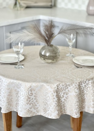 Teflon coated tablecloth ø138 cm. (54 in.) for a round table3 photo