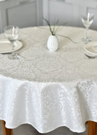 Teflon coated tablecloth ø138 cm. (54 in.) for a round table4 photo