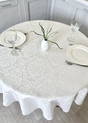 Teflon coated tablecloth ø138 cm. (54 in.) for a round table5 photo