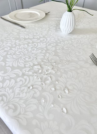 Teflon coated tablecloth ø138 cm. (54 in.) for a round table2 photo