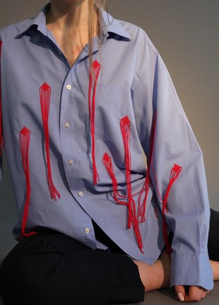 Decorated shirt with embroidery