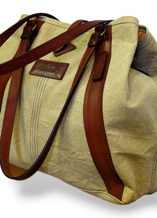 Canvas bag with natural leather parts