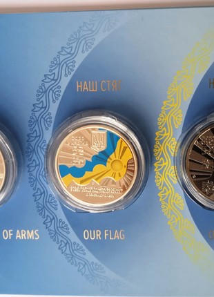 A set of three coins of Ukraine in a souvenir package "State symbols of Ukraine"