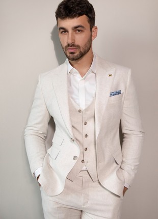 Three-piece beige suit by Andreas Moskin