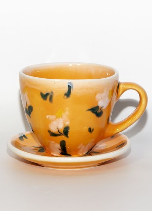 Orange tea-set with flowers