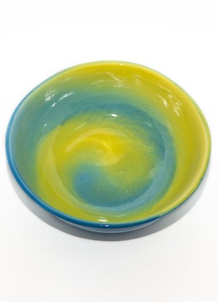 Handmade yellow-blue ceramic bowl
