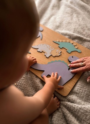 The wooden board puzzle Dinosaurs