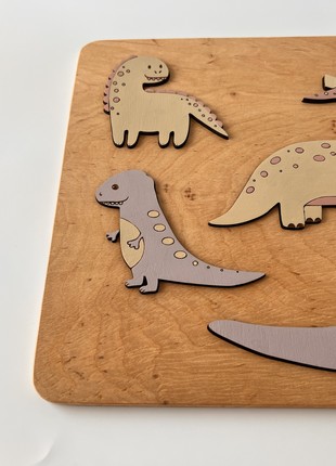 The wooden board puzzle Dinosaurs