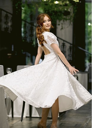 White elegant lace dress with short sleeves