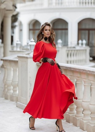 Elegant elegant red dress midi length with an open back