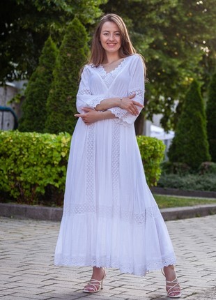 Long-sleeved floor-length cotton dress with openwork inserts