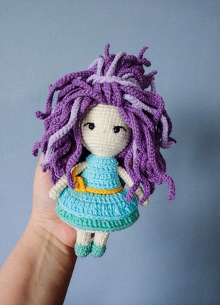 Crochet girl. miniature amigurumi. handmade doll. crochet toy