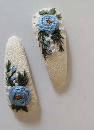 A pair of handmade hair clips