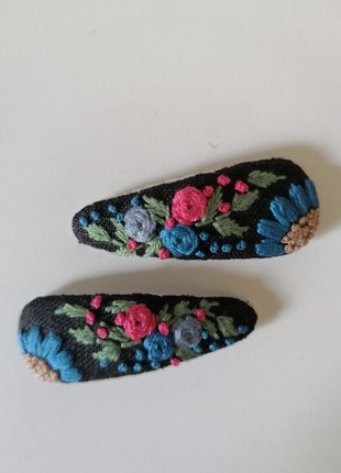 A pair of handmade hair clips