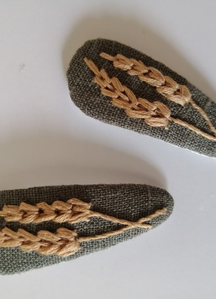 A pair of handmade hair clips