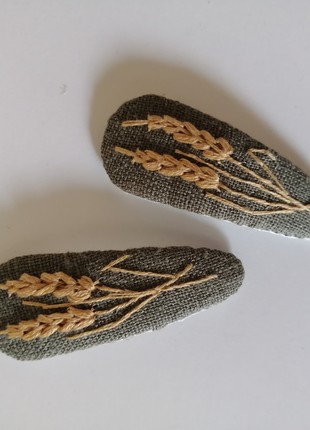 A pair of handmade hair clips