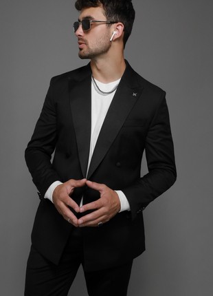 Two-piece black double-breasted suit by Andreas Moskin